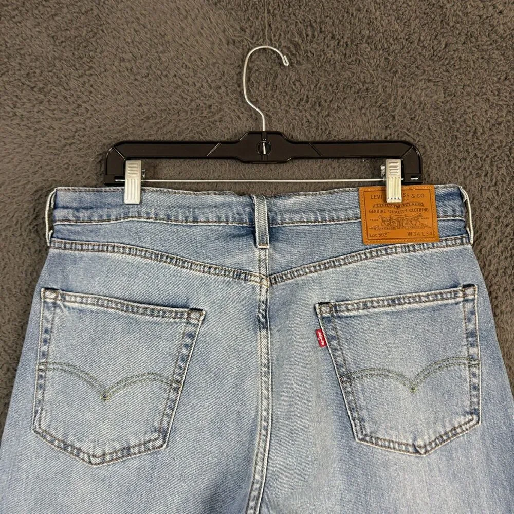 Levis Jeans Mens 34x34 Blue 502 Slim Tapered Fit Light Wash Premium Denim NWT